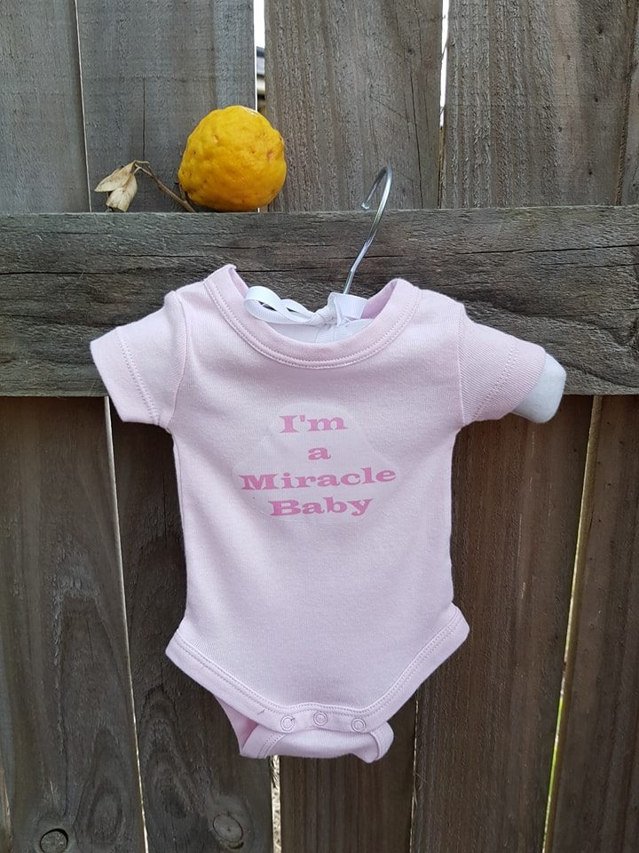 Miracle 2024 baby onesie